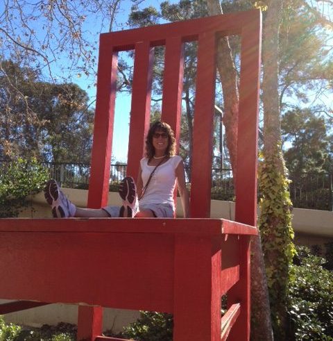 Anna on Giant Red Chair